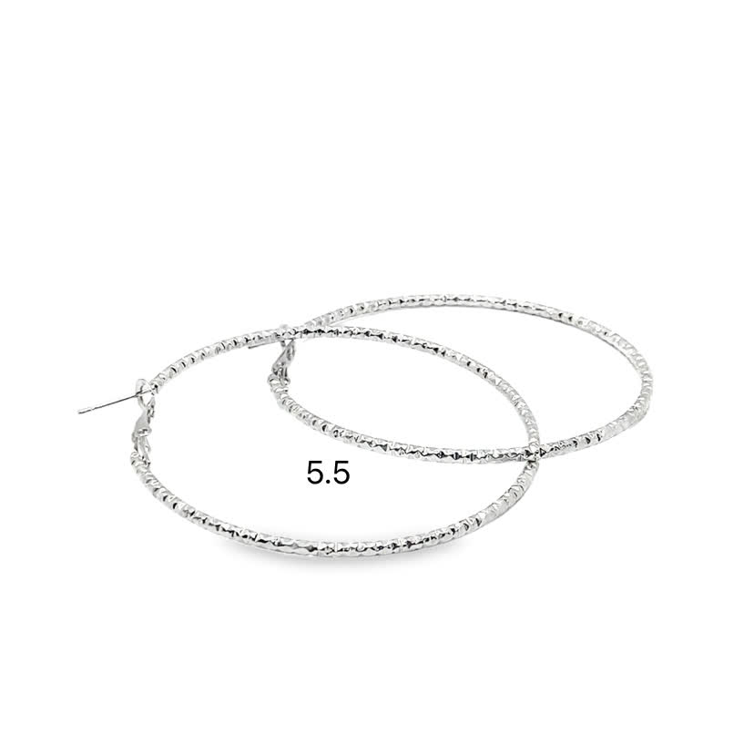 Teksturowane posrebrzane kolczyki koła