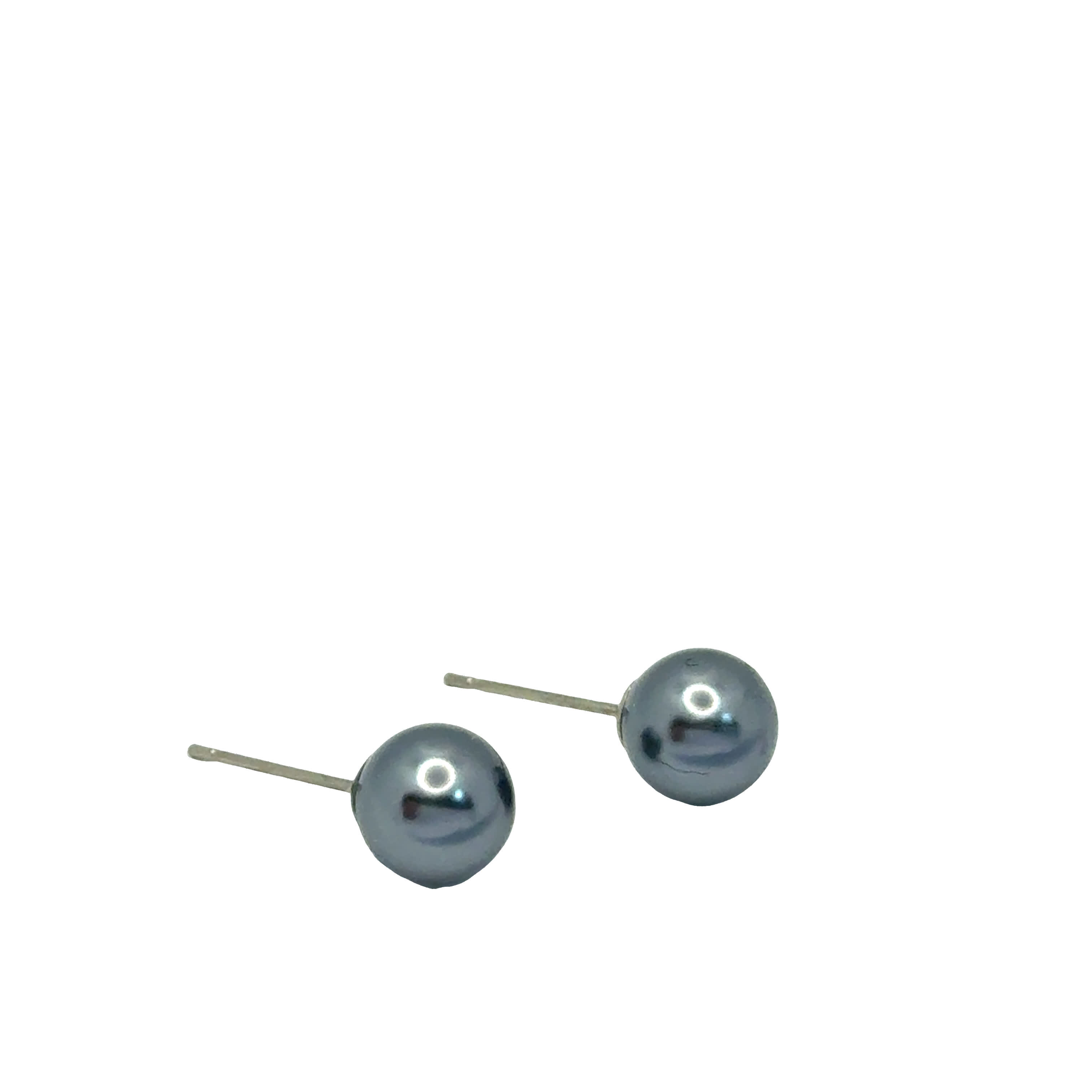 Kolczyki ze posrebrzanej stali i białego złocona z okrągłymi fioletowymi perłami