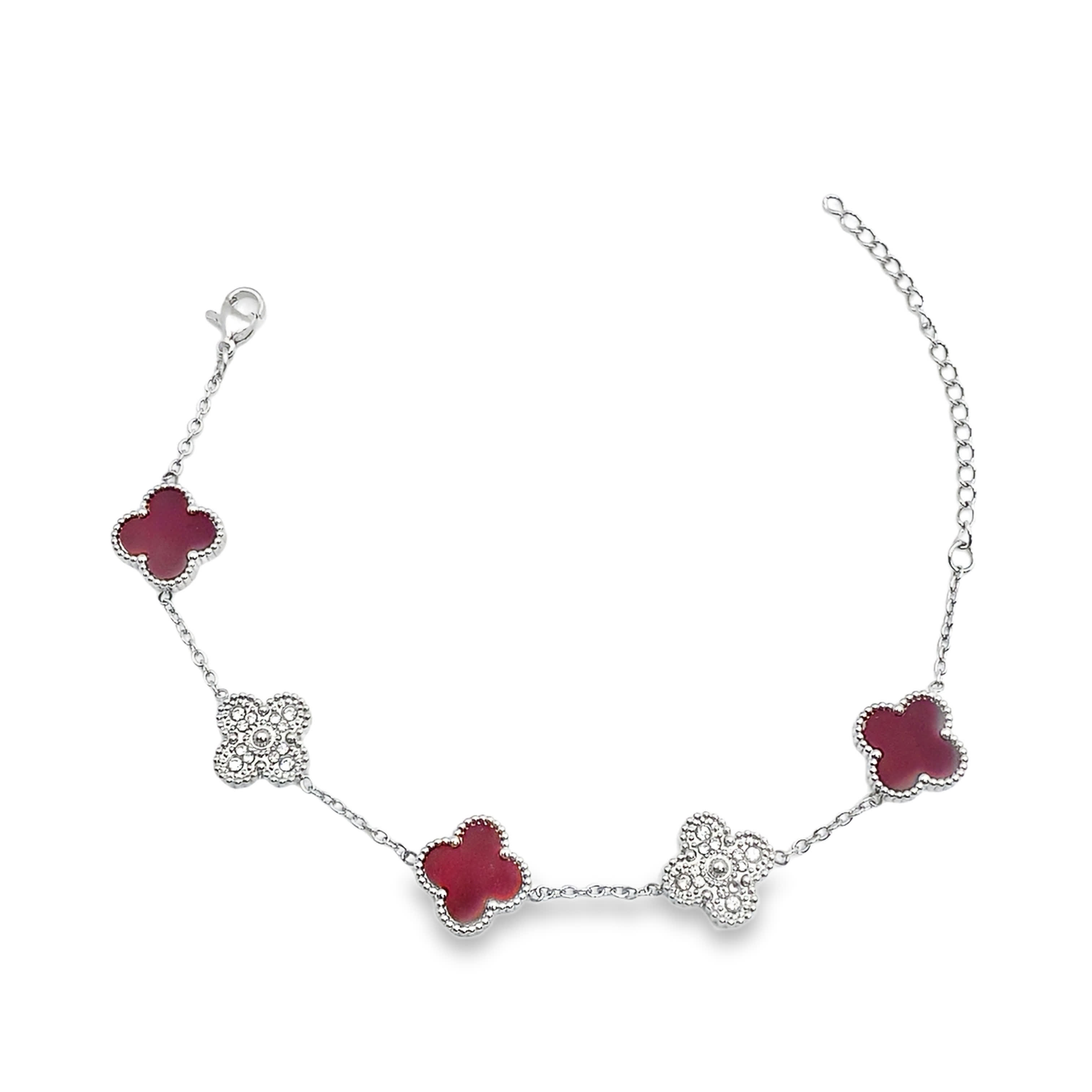 Elegancka bransoletka z zawieszką koniczyny w kolorze białego złota i srebra