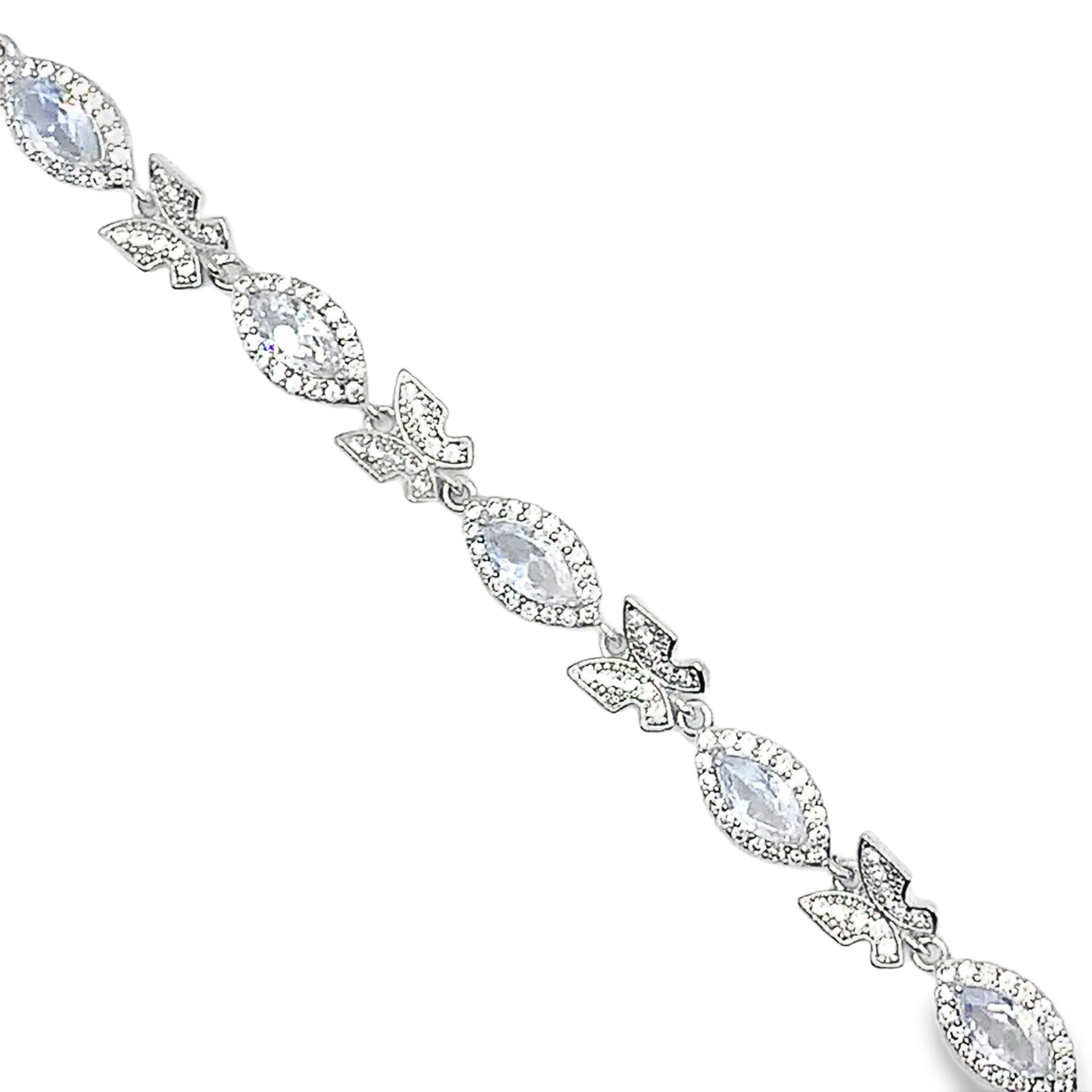 Bransoletka z białego złota na łańcuszku ze srebra i diamentami o szlifie owalnym