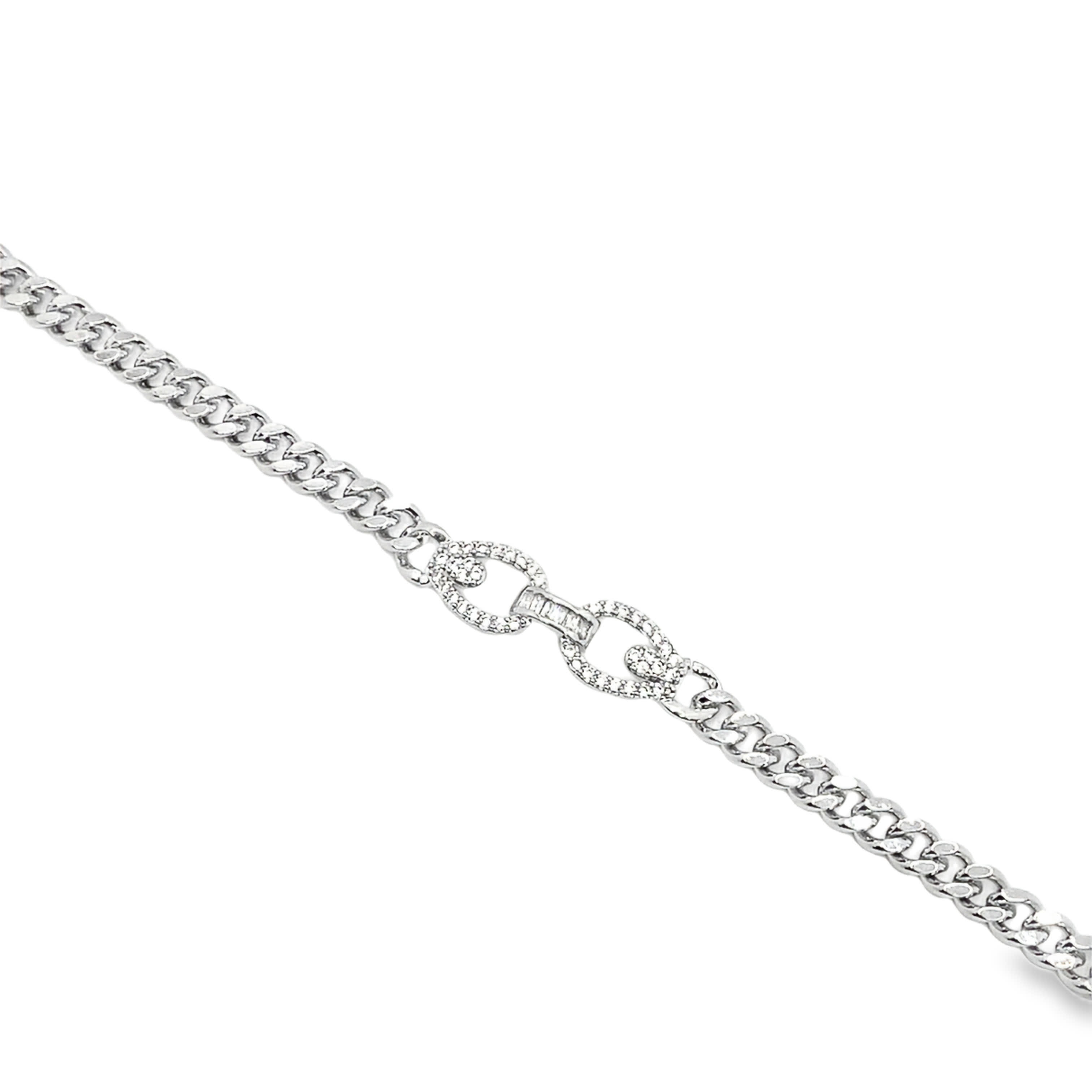 Elegancka bransoletka z białego złota z łańcuszkiem i brylantami