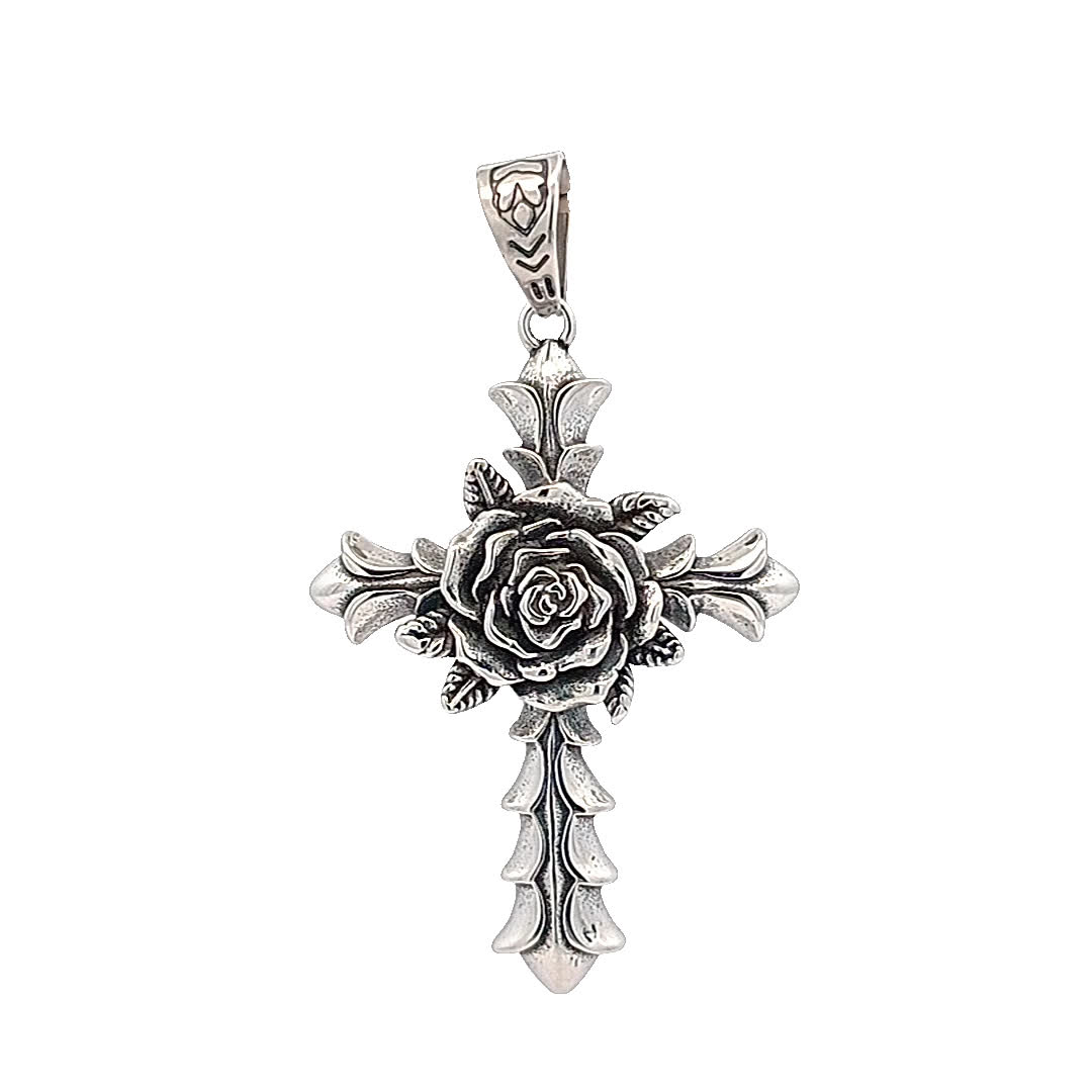 Elegancki posrebrzany krzyż wisiorek