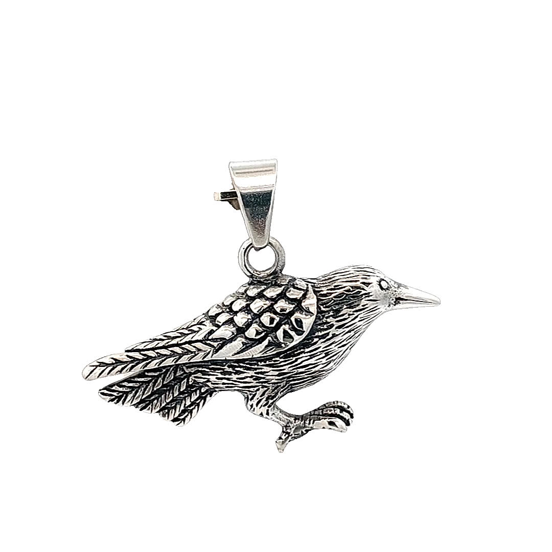Elegancki posrebrzany wisiorek w kształcie ptaka
