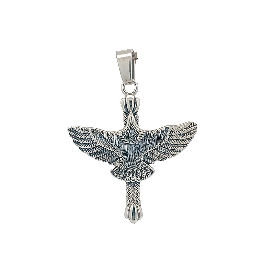 Elegancki posrebrzany wisiorek w kształcie ptaka