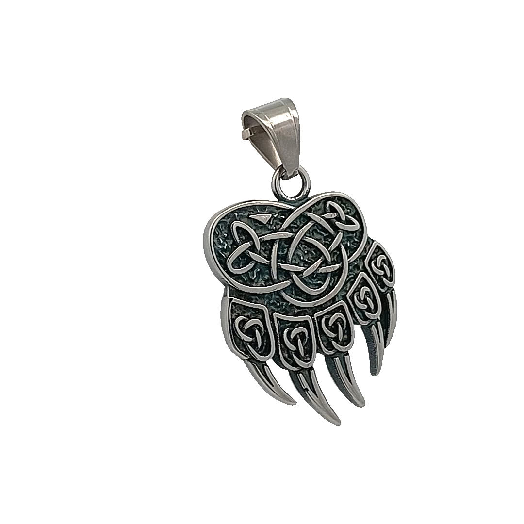 Skomplikowany posrebrzany wisiorek w kształcie pazura niedźwiedzia