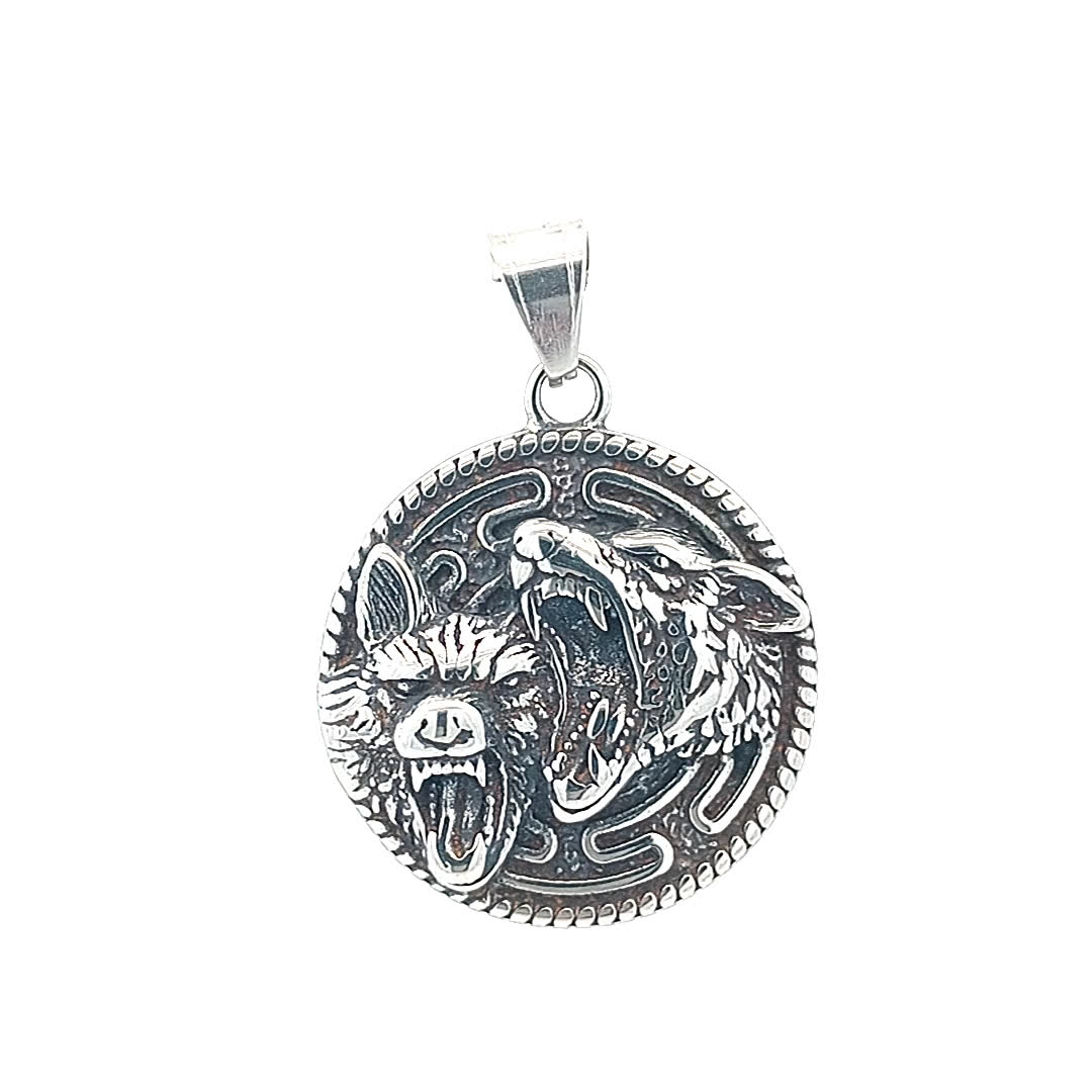 Skomplikowany posrebrzany wisiorek w kształcie zwierzęcia