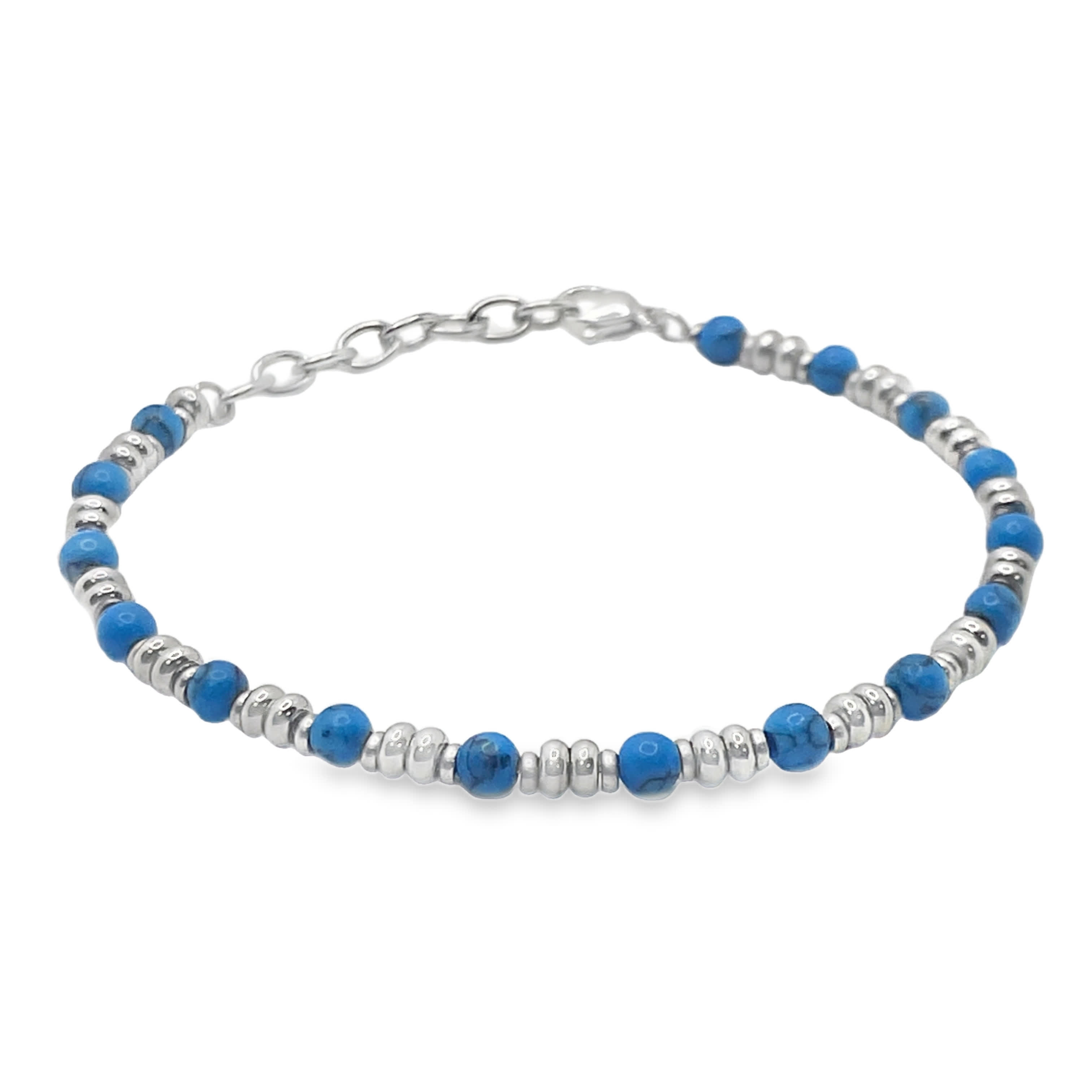 Posrebrzana bransoletka z koralikami i turkusowymi kamieniami  w kształcie kaboszonu