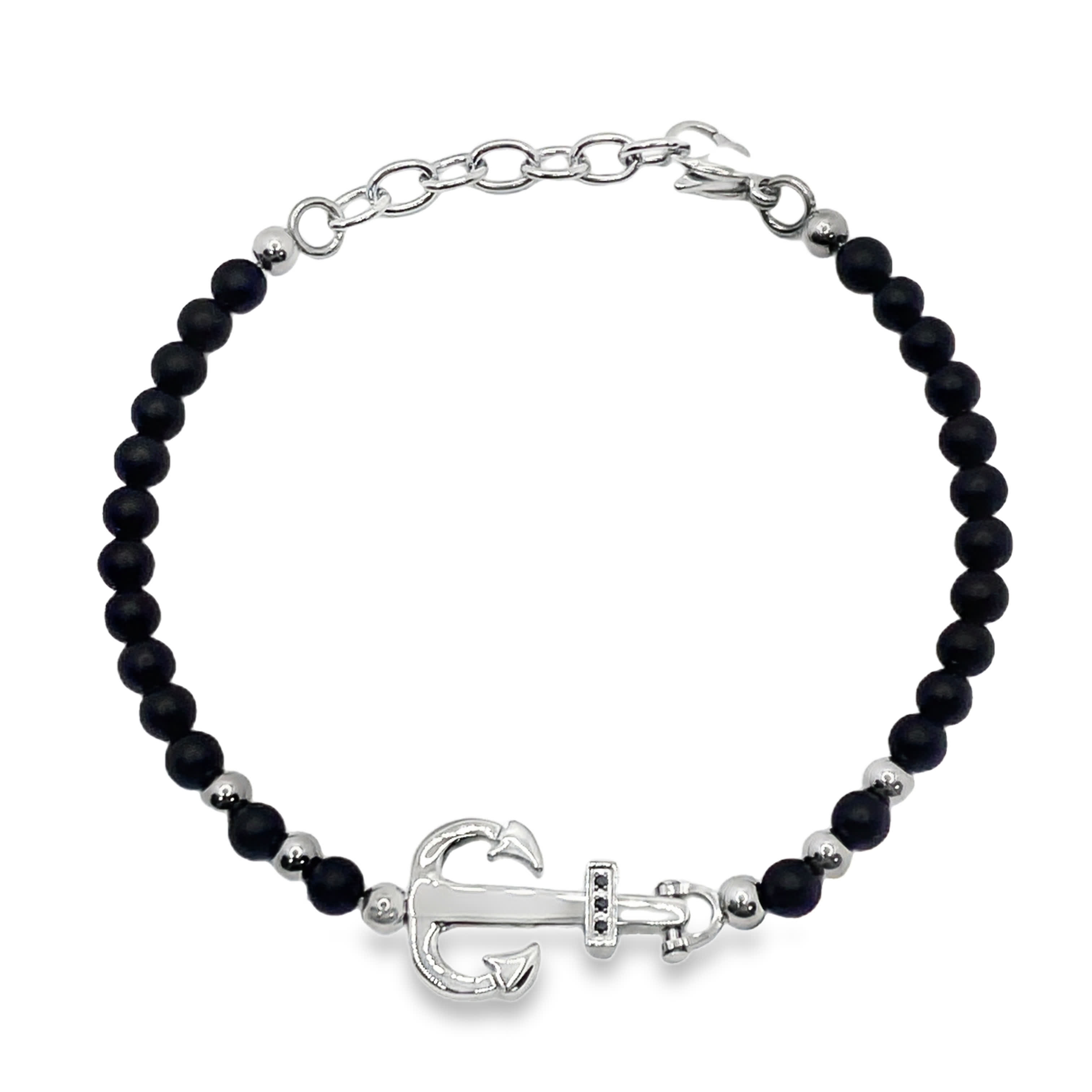 Bransoletka z koralików posrebrzanych z okrągłym kaboszonem onyksu