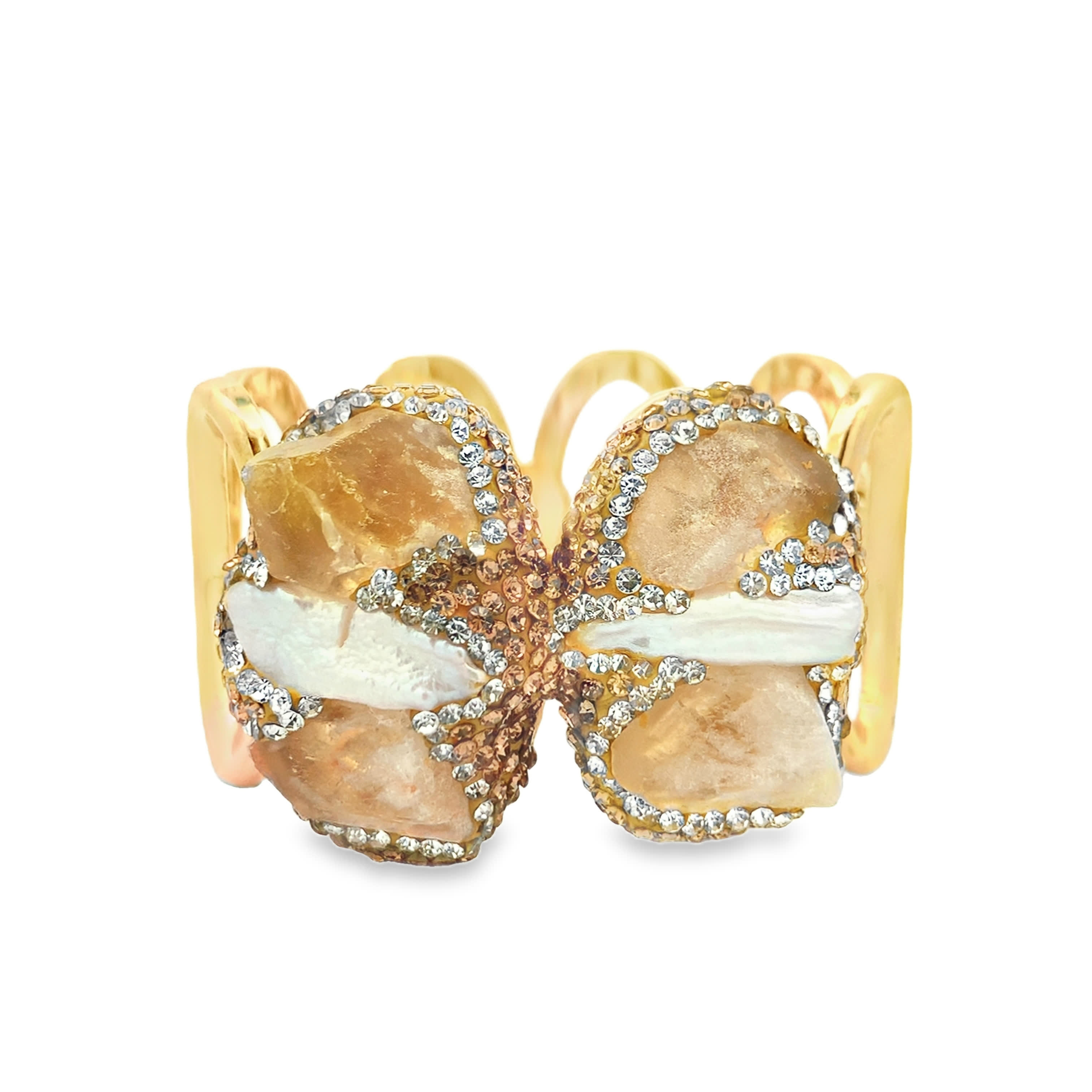 Sztywna bransoletka z pozłacanego metalu z kilkoma kamieniami ozdobnymi