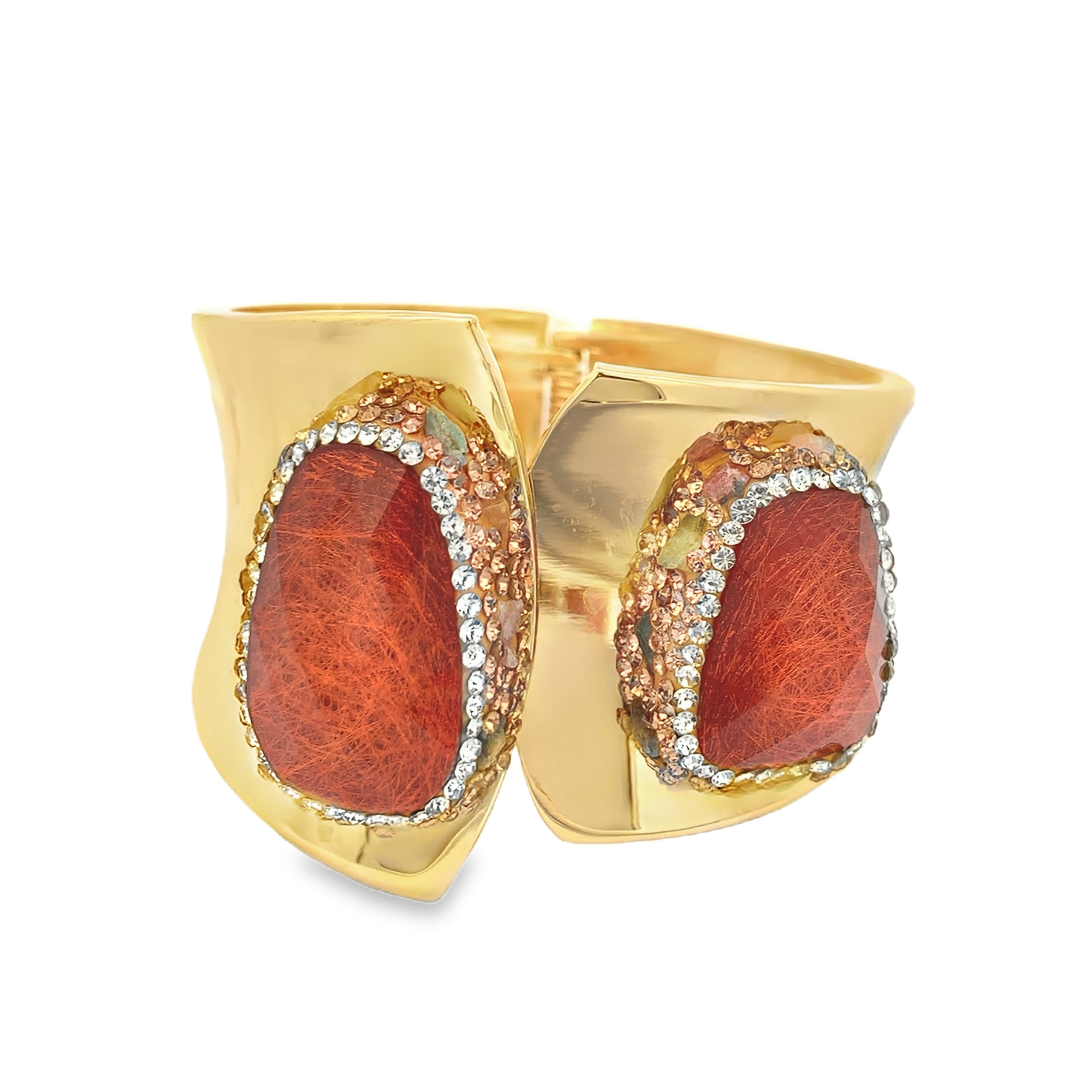 Sztywna bransoletka z pozłacanego metalu z czerwonymi kamieniami ozdobnymi