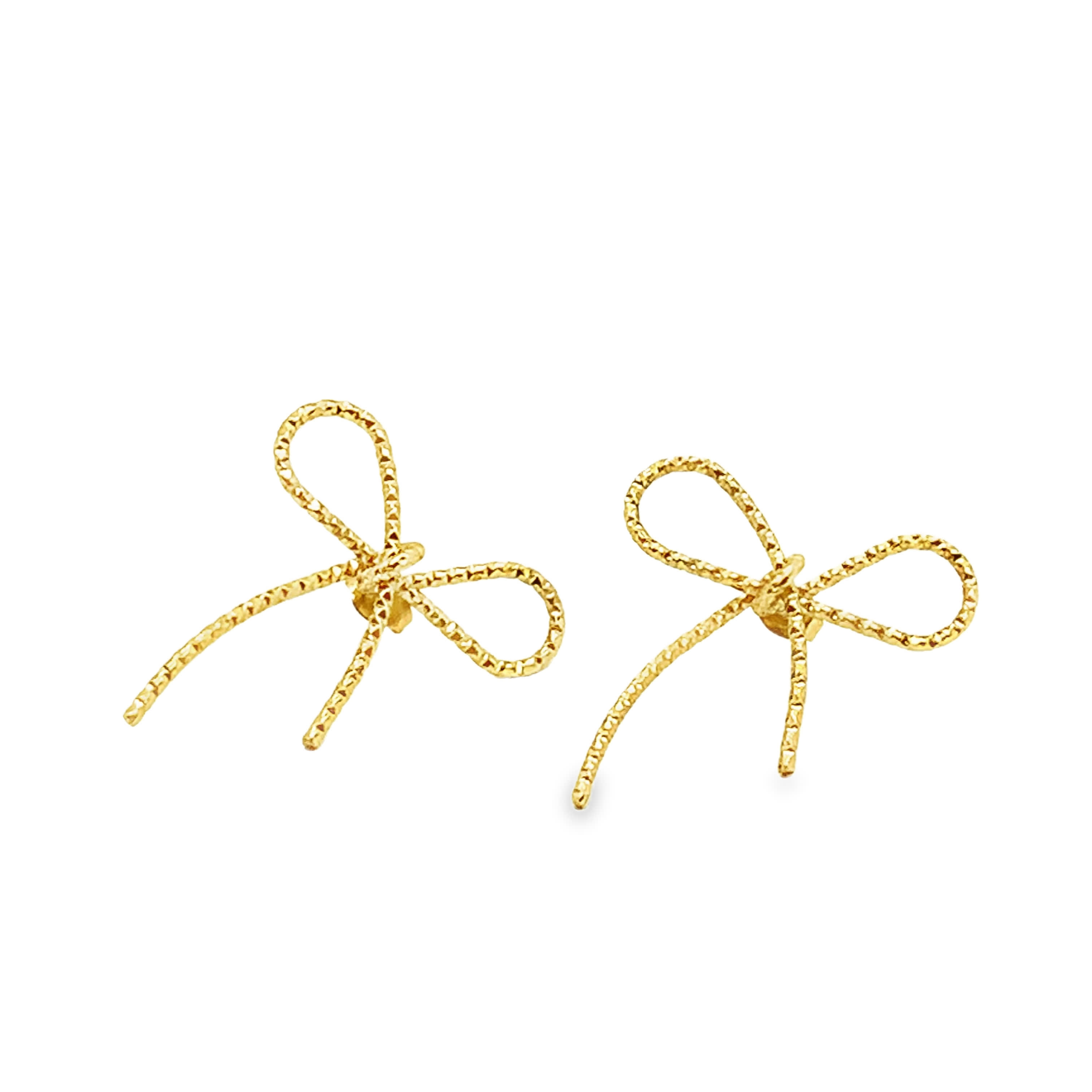 Złocone kolczyki z kokardką