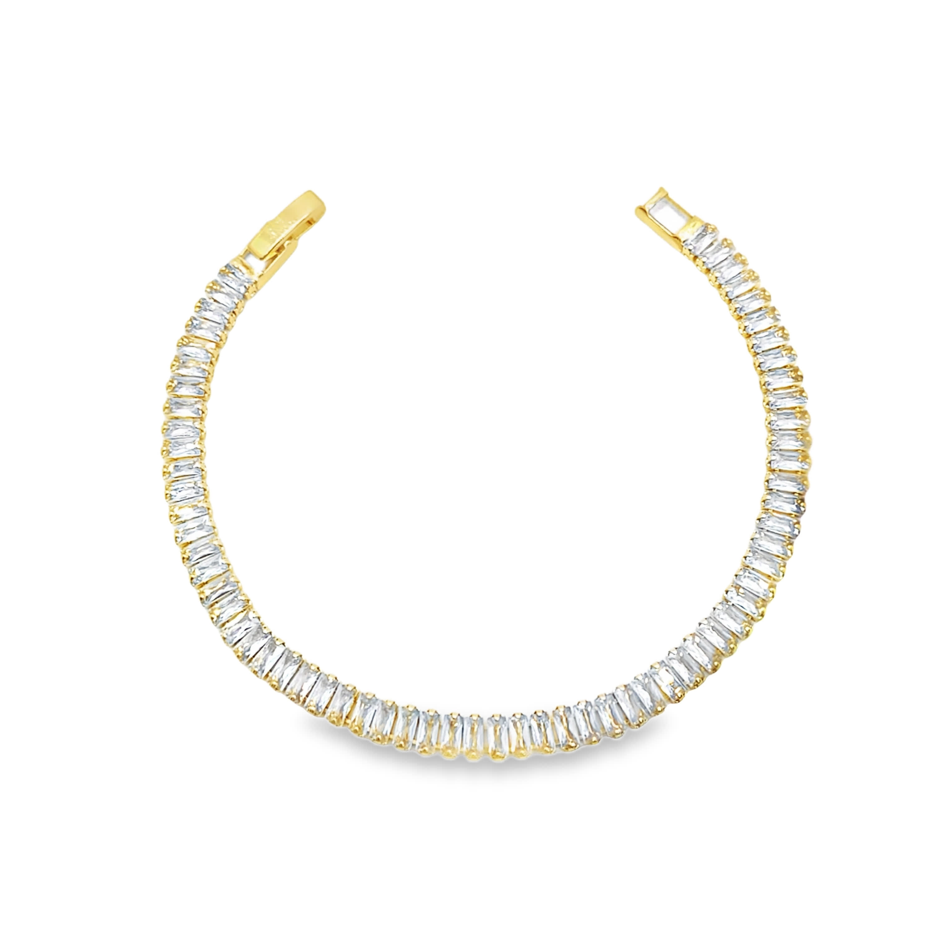 Bransoletka tenisowa ze złoconej stali z kamieniami o szlifie bagietkowym