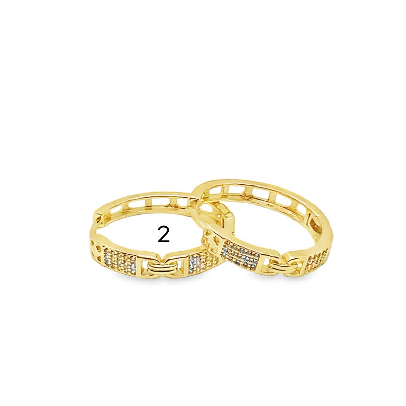 Fantazyjne kolczyki-koła ze złoconej stali i kamieni