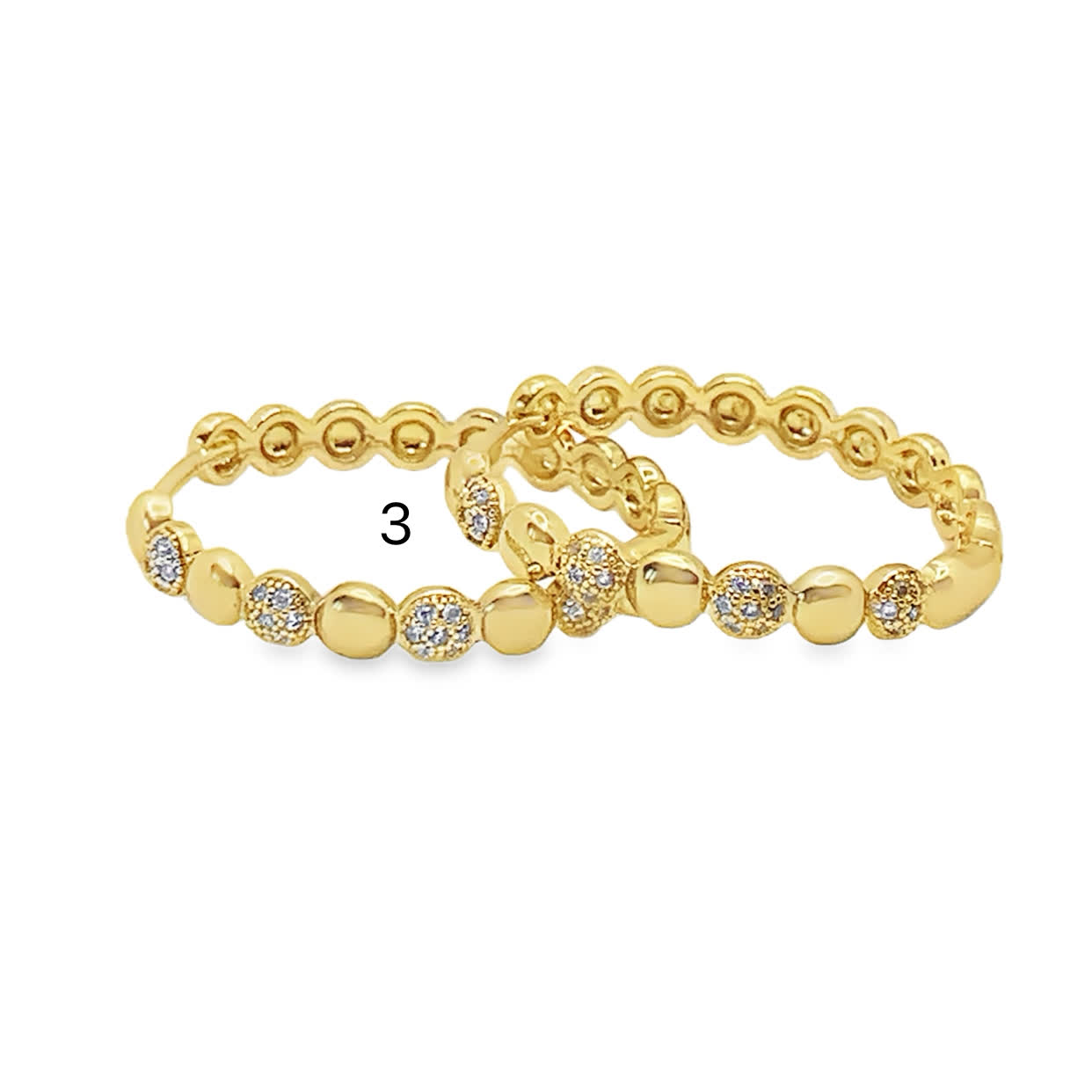 Bransoleta ze złoconej stali z okrągłymi kamieniami