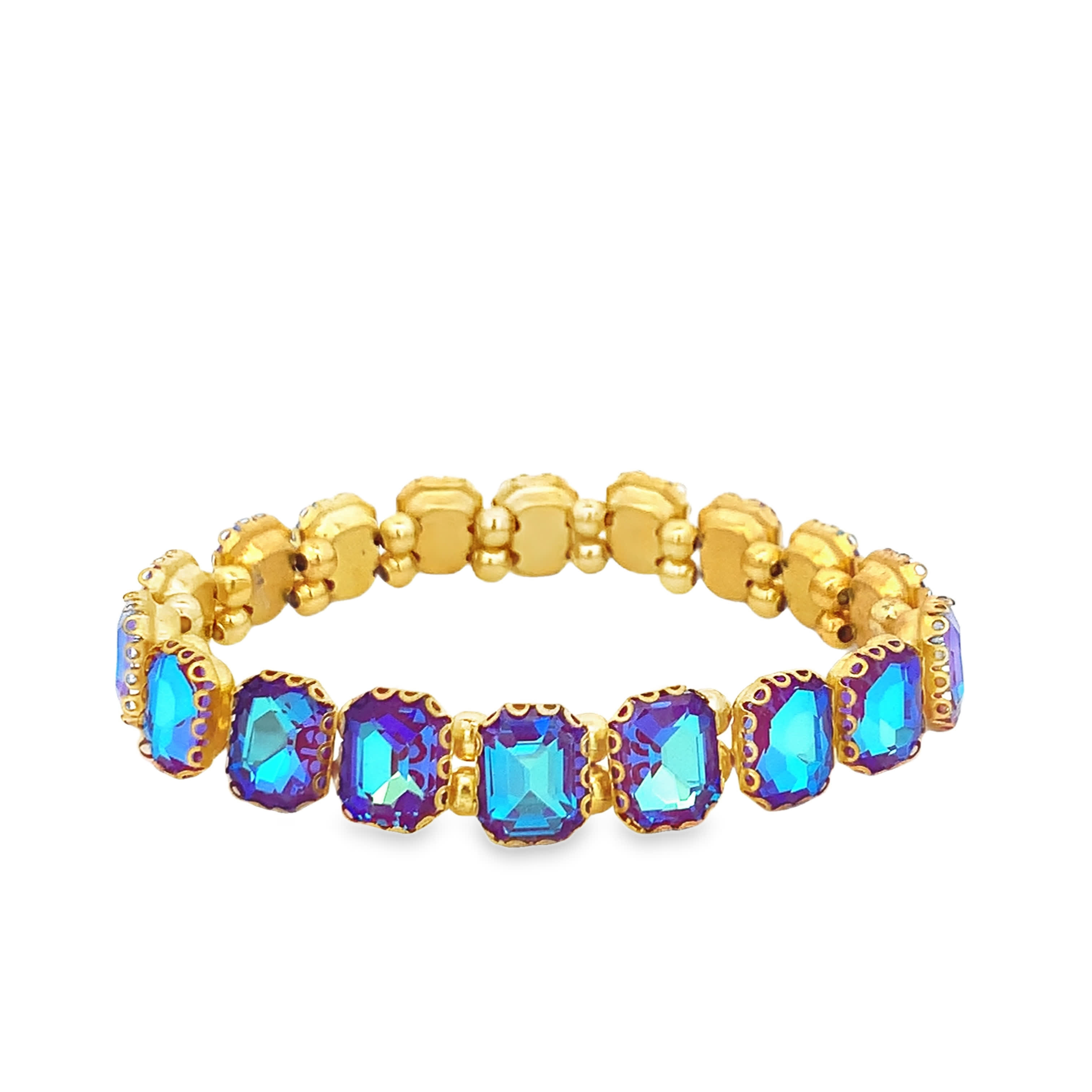 Bransoletka tenisowa w kolorze żółtego złota z niebieskimi kryształami o szlifie szmaragdowym