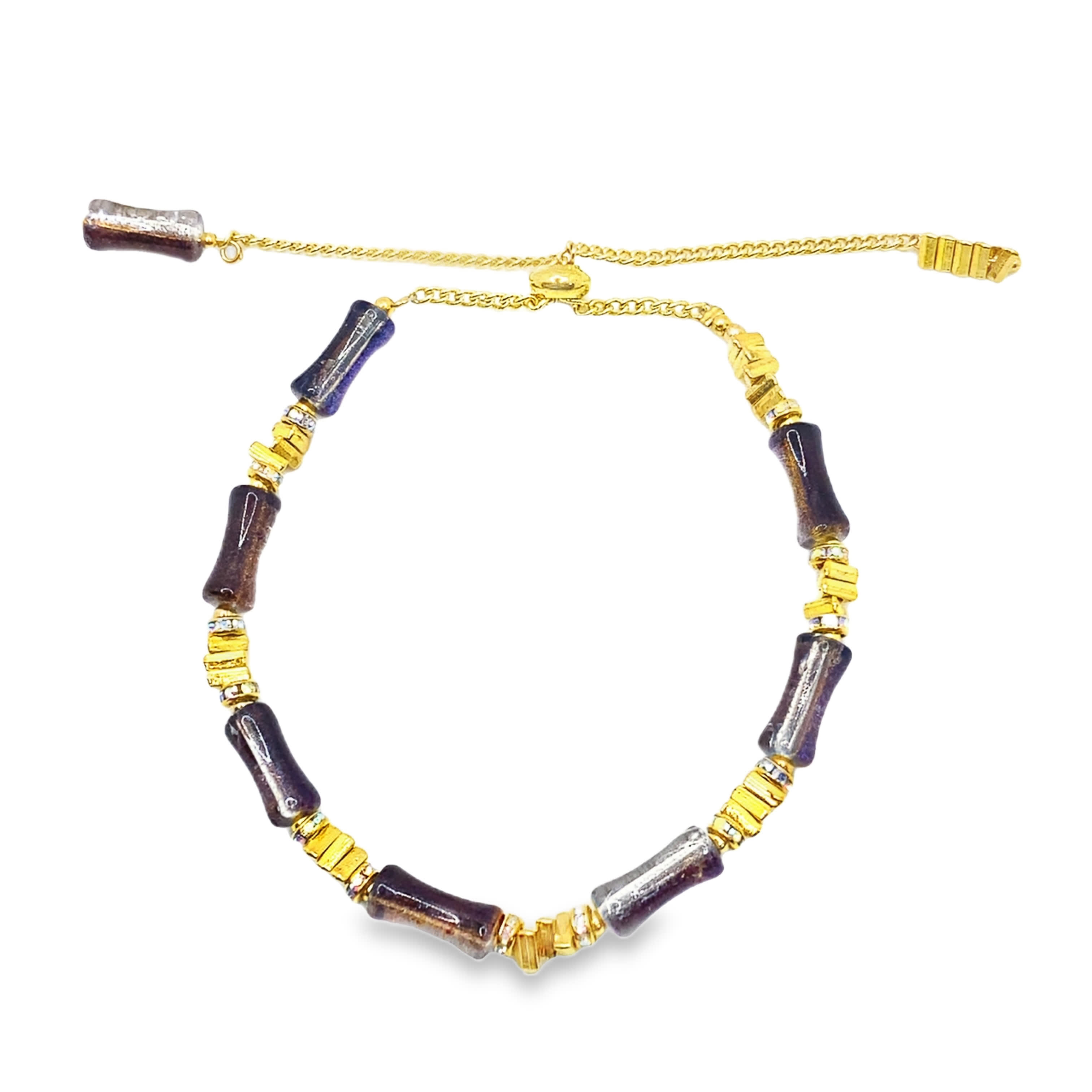 Bransoletka z koralików w kolorze żółtego złota z fioletowymi kaboszonami kwarcu