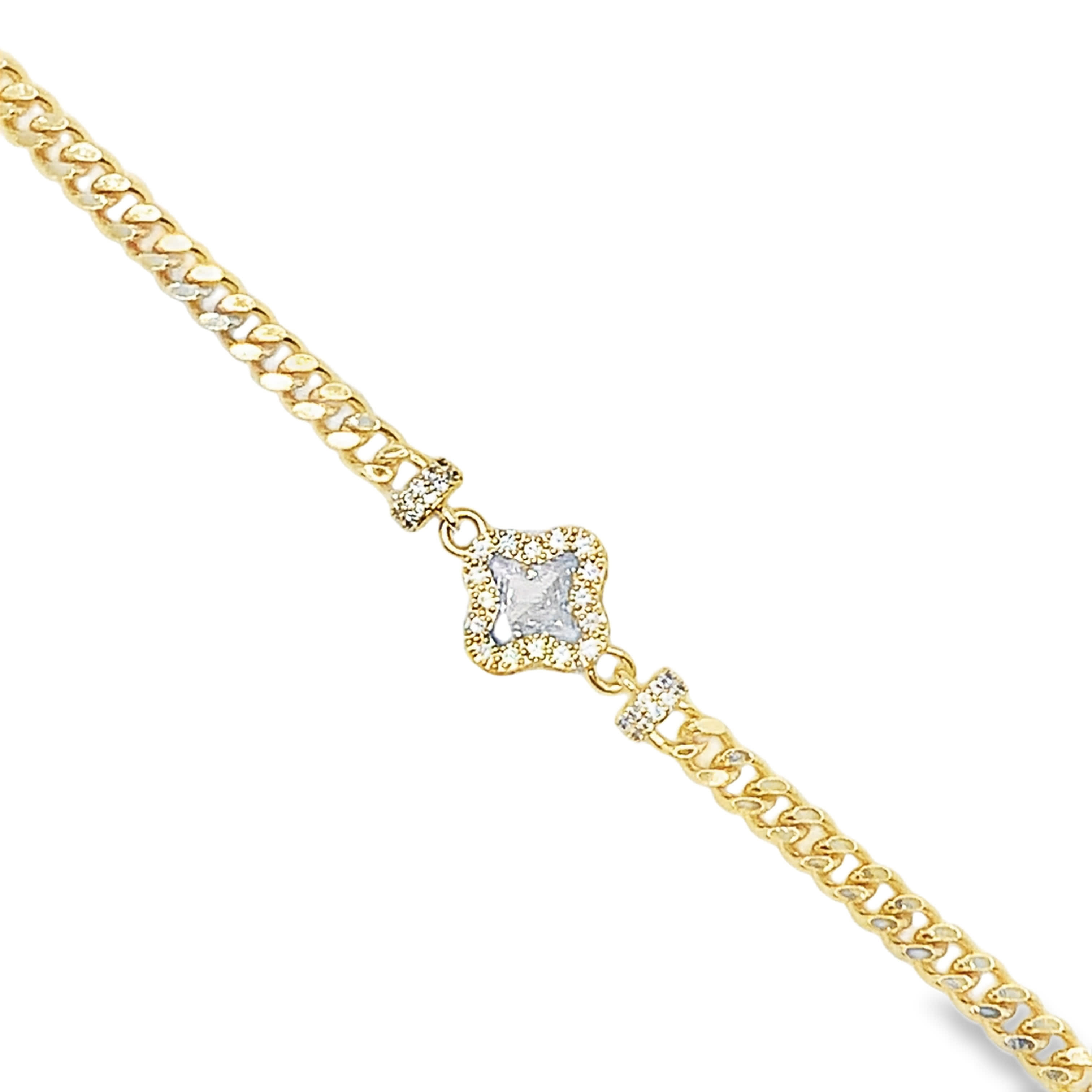 Bransoletka w kolorze żółtego złota z łańcuszkiem i kwadratowym diamentem