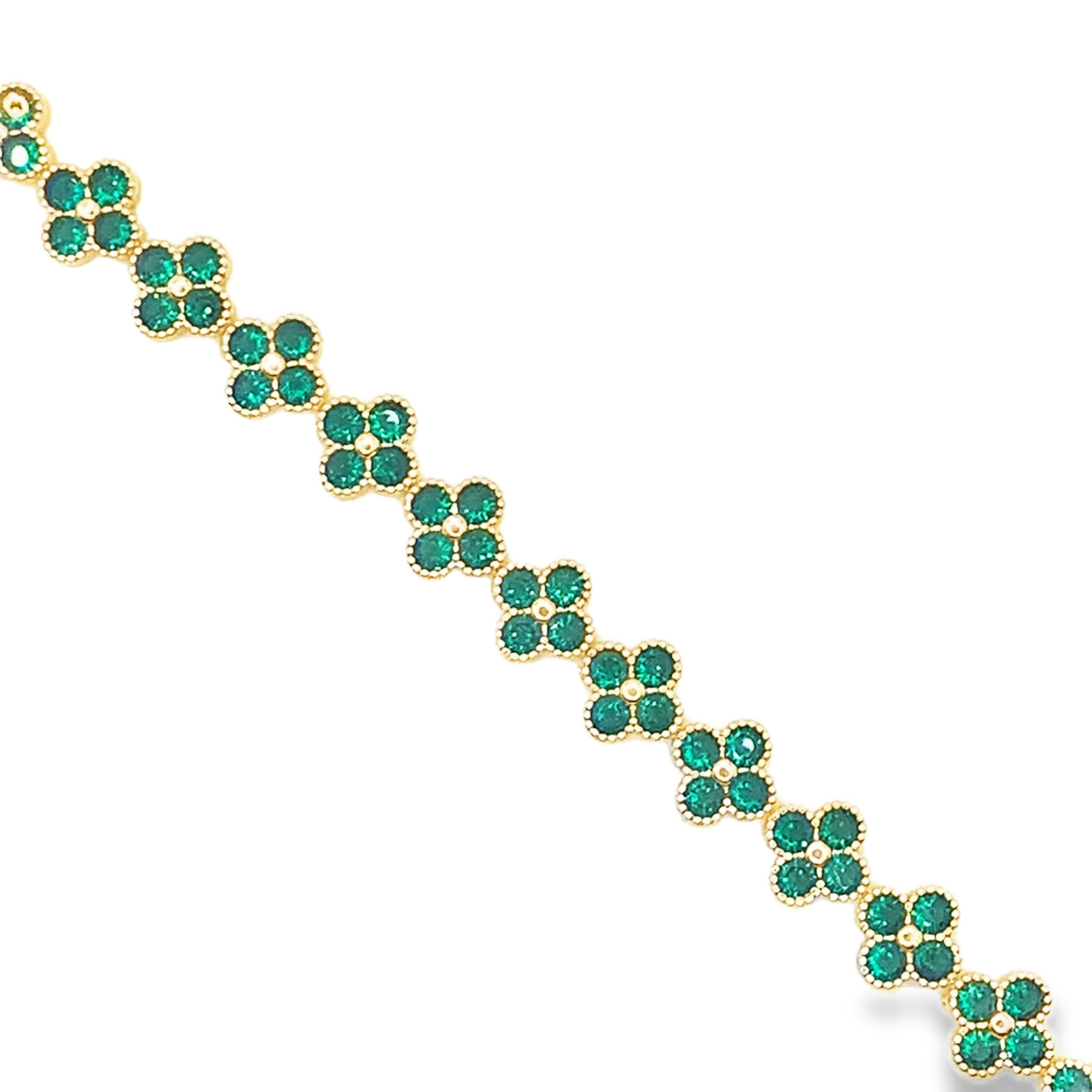 Bransoletka w kolorze żółtego złota z okrągłymi szmaragdami