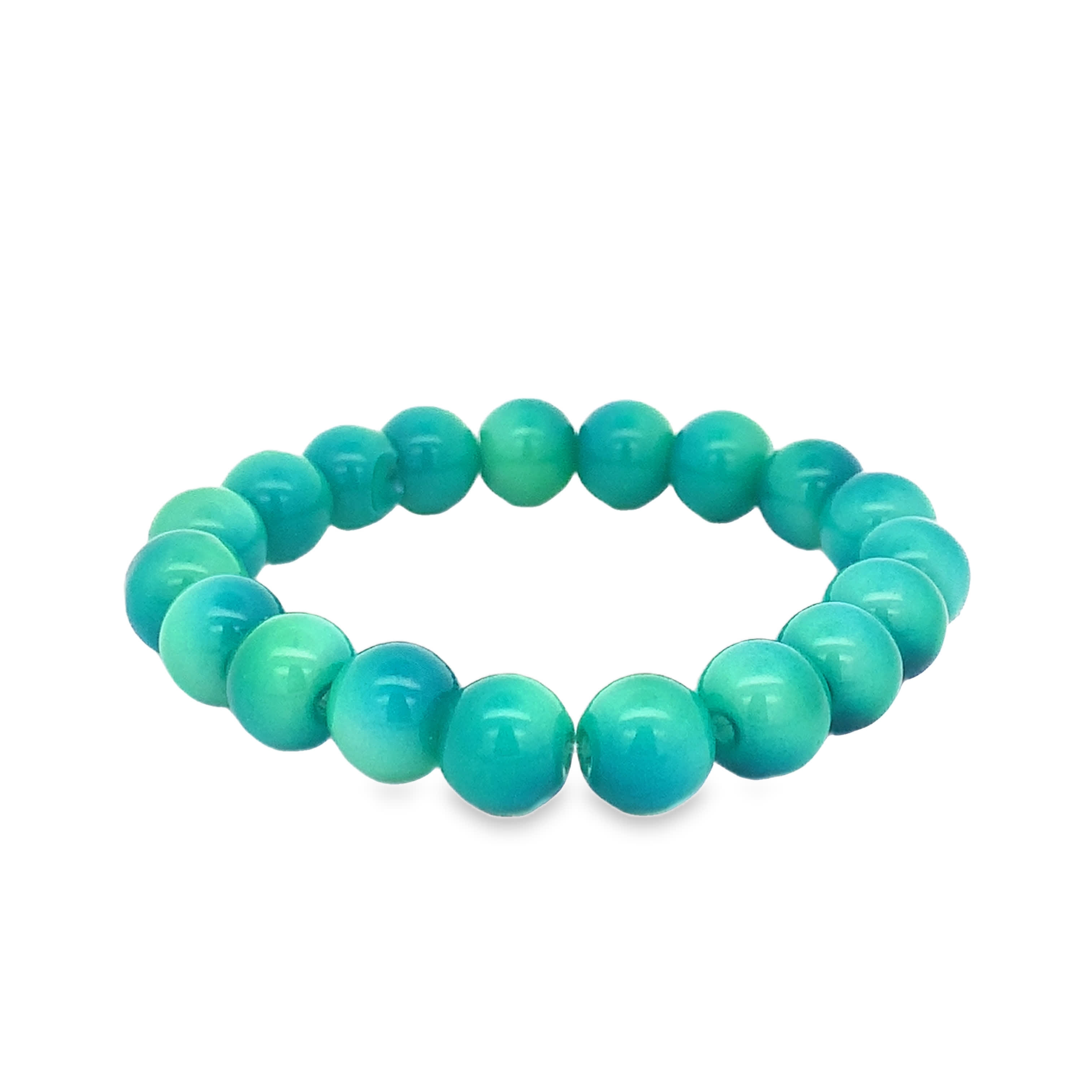 Bransoletka z okrągłych koralików w kolorze turkusowym ze szlifem kaboszonowym