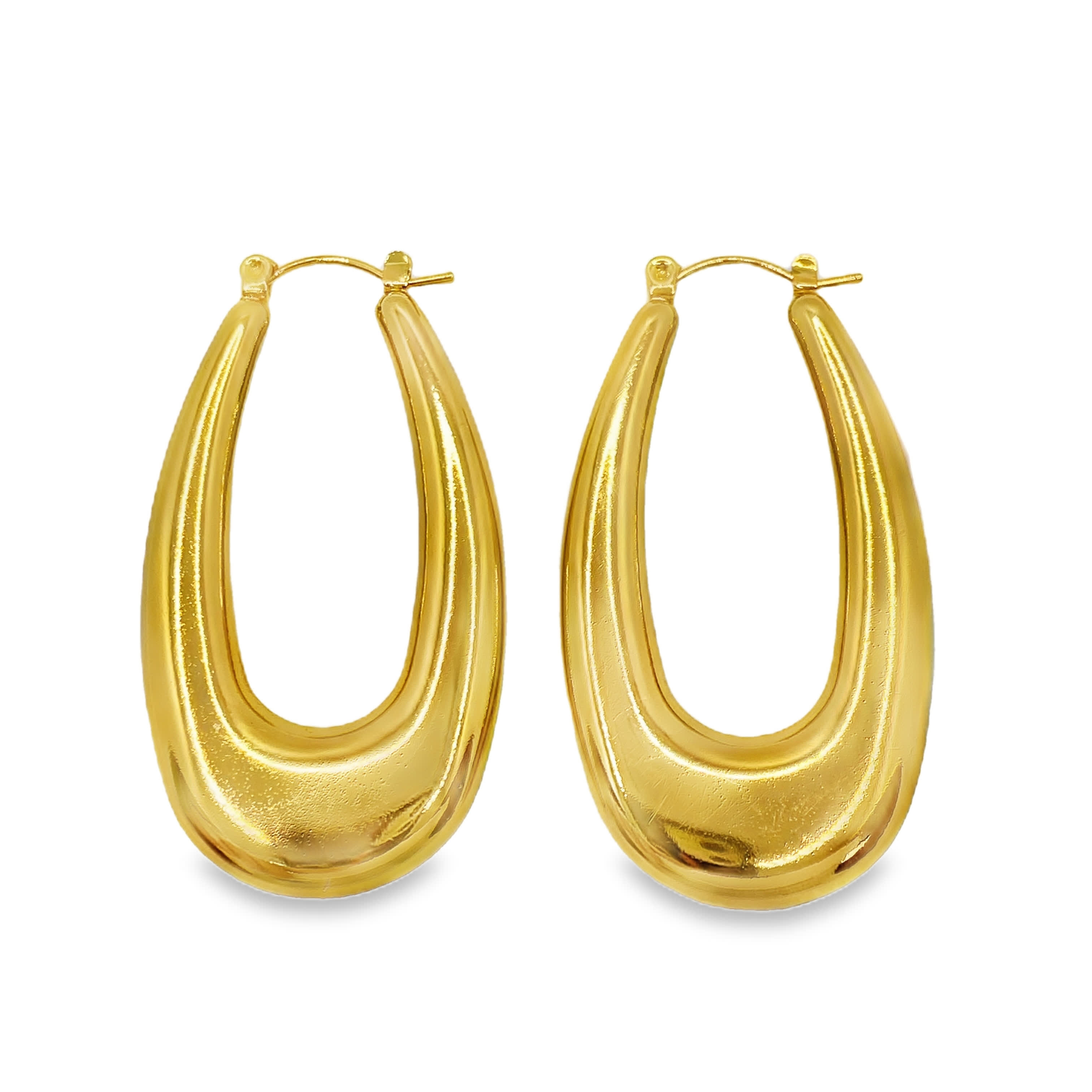 Nowoczesne złocone wydłużone kolczyki koła