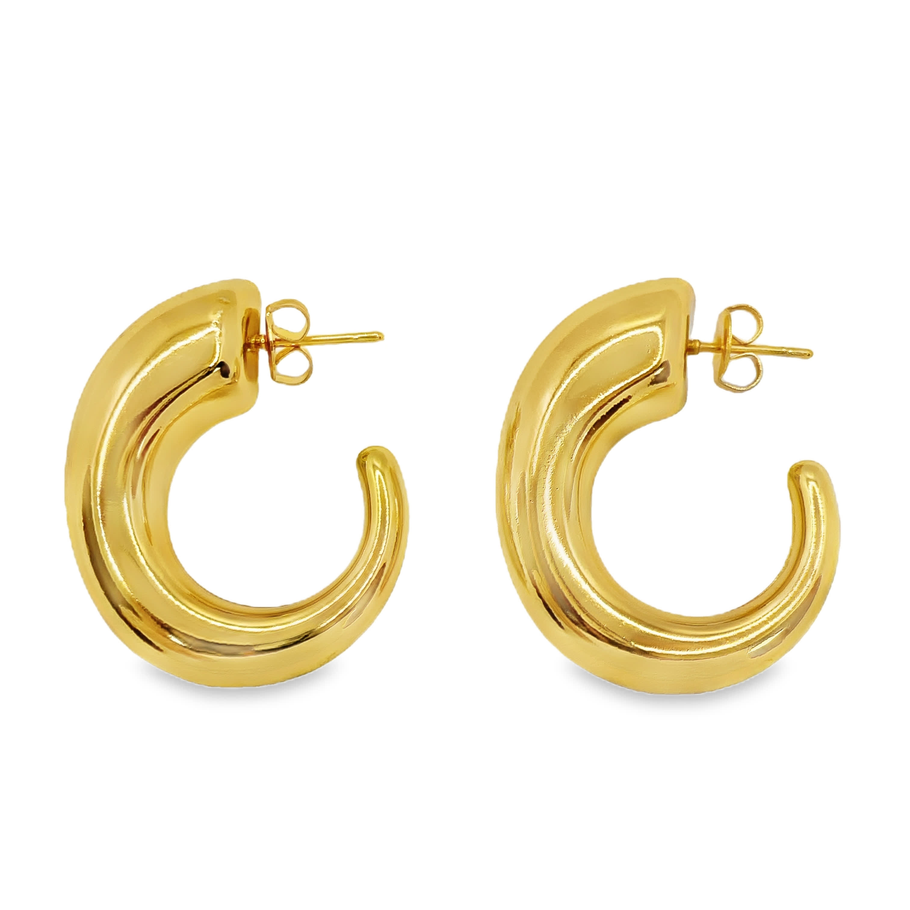 Masywne złocone kolczyki koła – nowoczesna biżuteria z wyrazistym wzorem