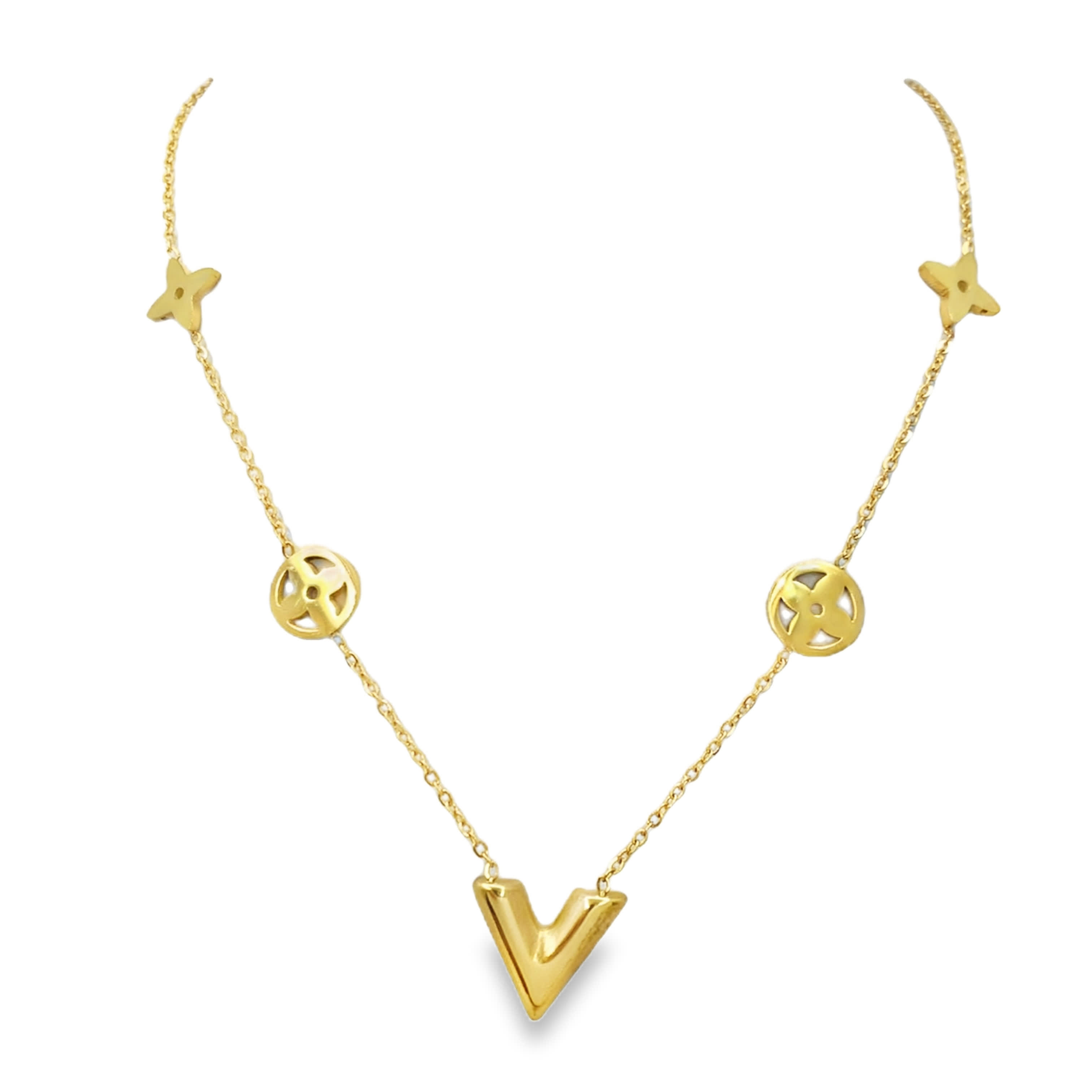 Naszyjnik ze złoconej stali z motywem kwiatowym i literą „V”