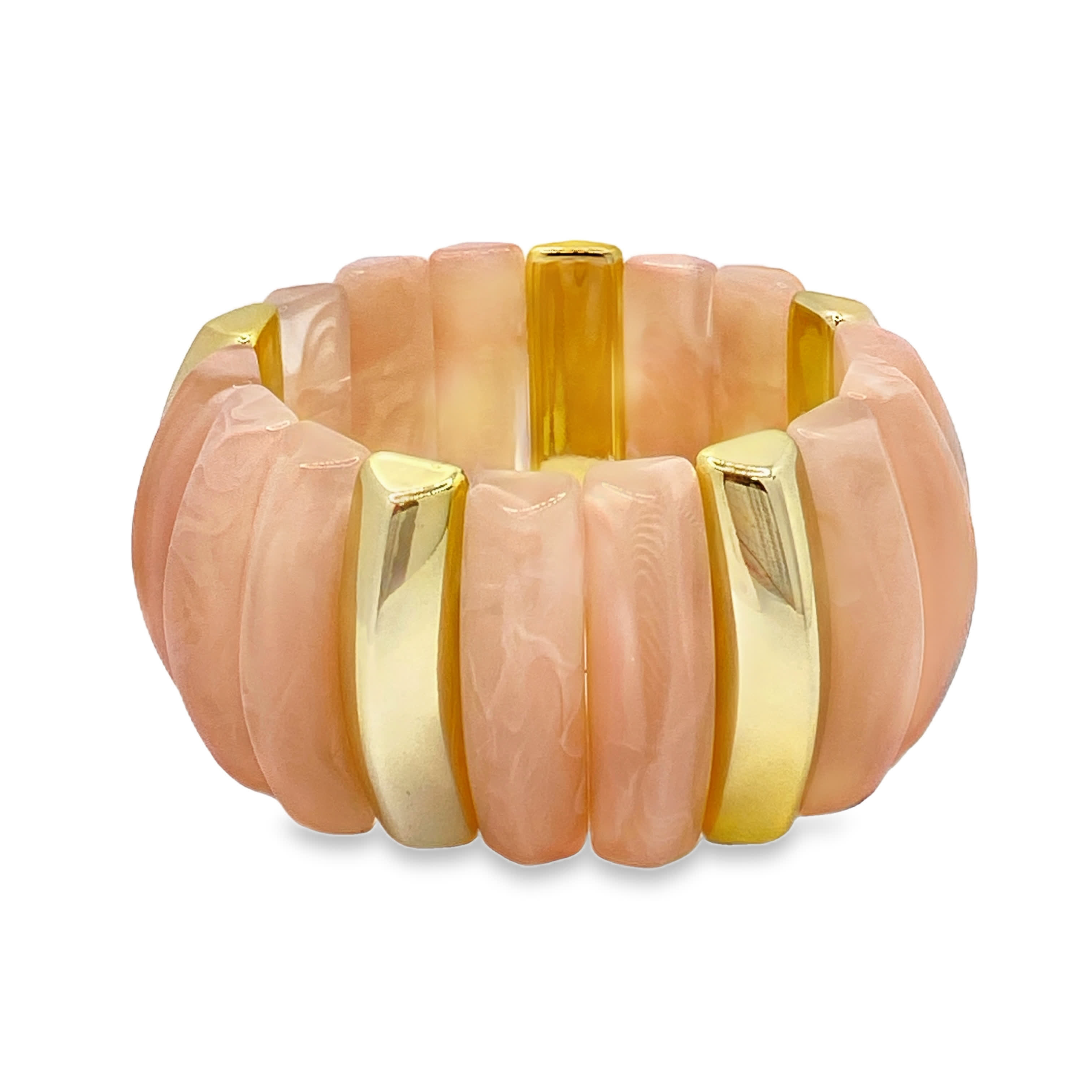 Bransoletka typu bangle w kolorze brzoskwiniowym z marmurkowymi zdobieniami w kolorze złocistym