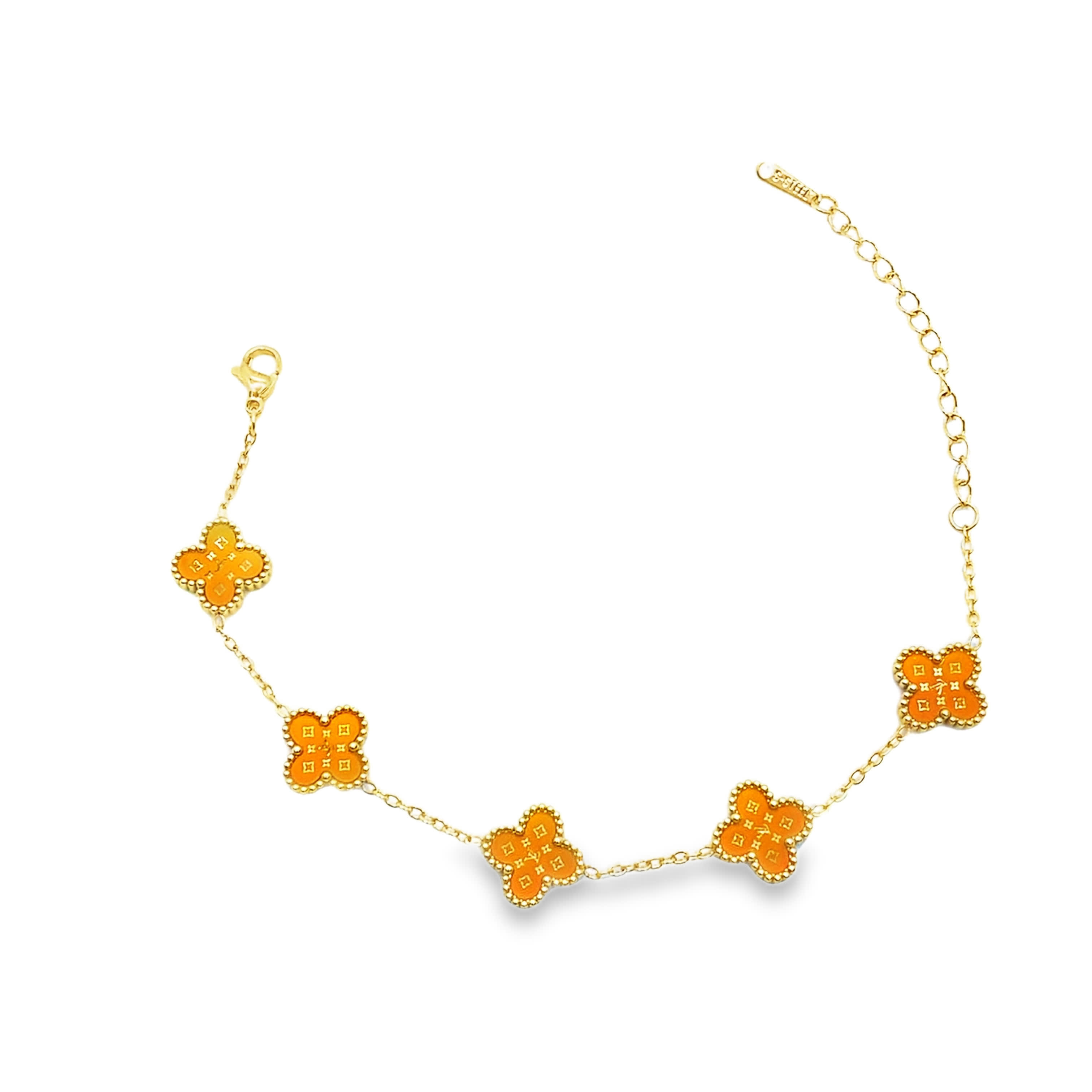 Elegancka bransoletka w kolorze żółtego złota z motywem koniczyny