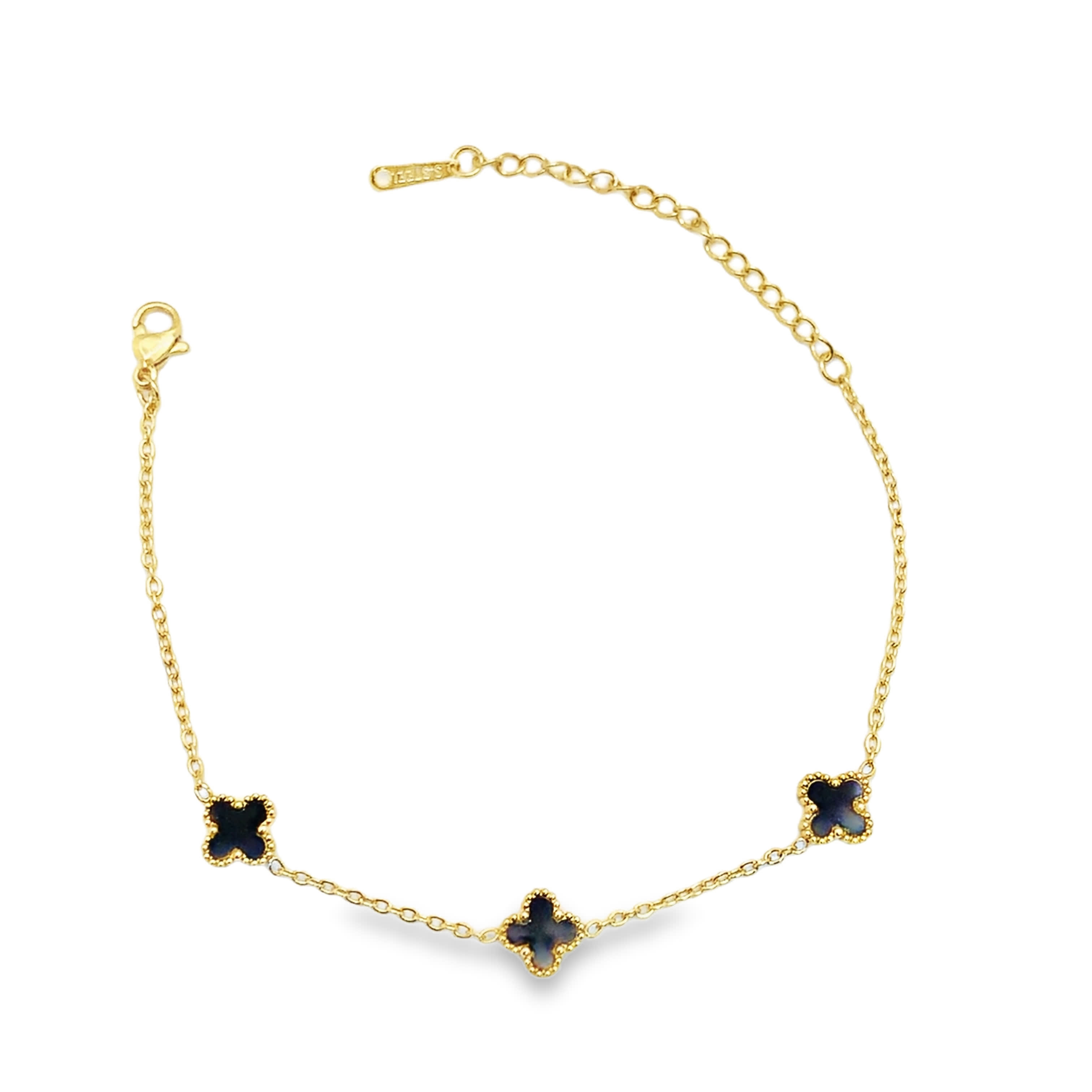 Bransoletka w kolorze żółtego złota z łańcuszkiem i akcentami koniczyny i onyksu