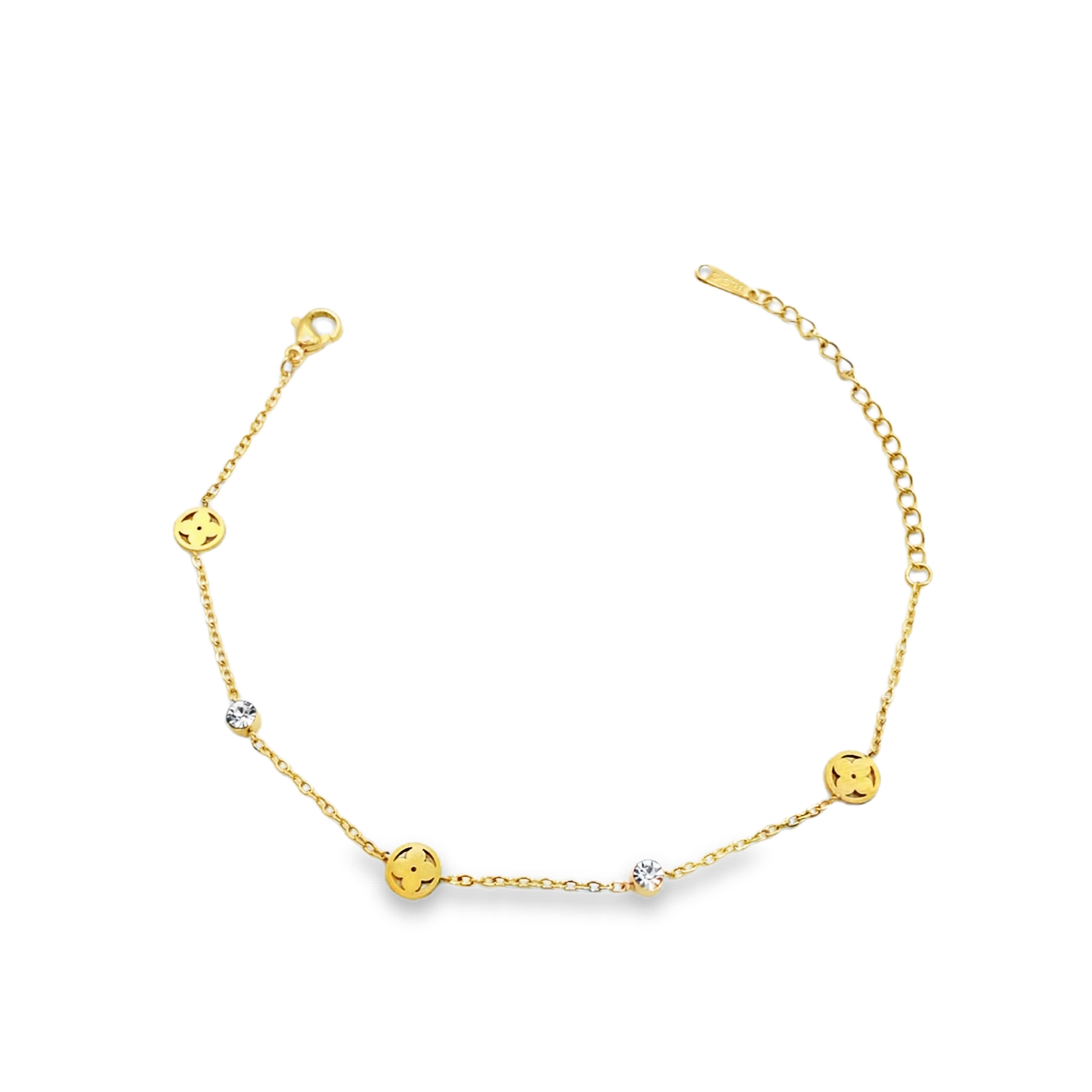Bransoletka z żółtego złota z łańcuszkiem i akcentami diamentowymi